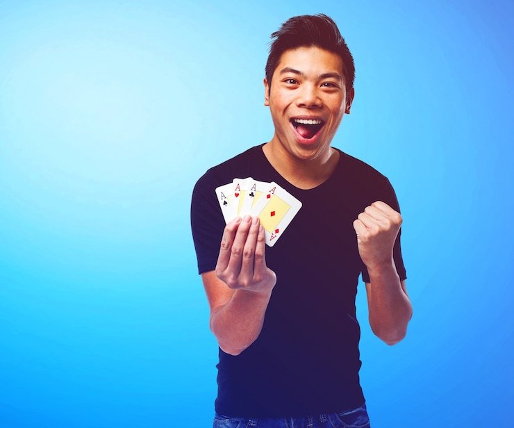 Filipino player enjoying jackpot slots on mobile phone